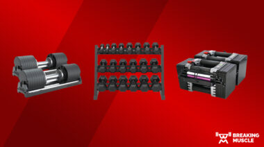 Different sets of dumbbells on a red background