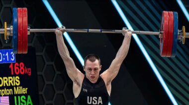 Weightlifter Hampton Morris performing clean and jerk in competition